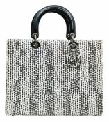A Christian Dior Snakeskin Lady Dior Bag. Black and white snakeskin exterior with black leather