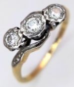 A Vintage 18K Yellow Gold, Platinum and Three Stone Diamond Ring. Size O. 2.8g total weight.