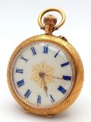 An Antique 14K Gold Cased Ladies Pocket Watch. Top winder. White enamel with gilded dial. 3cm