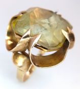 A 9K Yellow Gold Lemon Quartz Ring. A c.20ct cushion cut lemon quartz in a claw setting. Size N. 9.