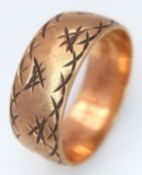 A Vintage 9K Yellow Gold Decorative Band Ring. 8mm width. Size Q. 5.05g.