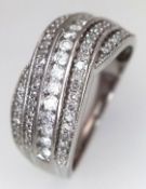 An 18K White Gold, 4 Row, Diamond Set, Crossover Ring. 0.50Ctw. 5.2G, Size N. Sc 4062
