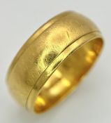 A 22K Yellow Gold Band Ring. 7mm width. UK hallmarks. Size L. 5.95g