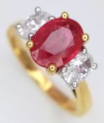 A FABULOUS 18K GOLD RING WITH A 1.52 OVAL FACETED RUBY FLANKED BY 2 BRILLIANT CUT .58cwt G/H