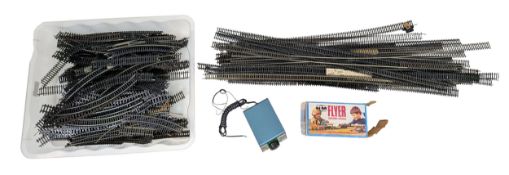 A large, job lot of Hornby OO gauge track. Comes with an H&M flyer transformer controller.