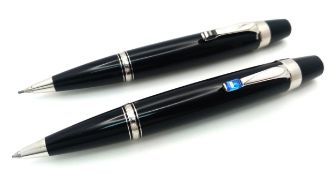A Montblanc Boheme Set of Ballpoint Pen and Pencil. Black resin with silver tone hardware.