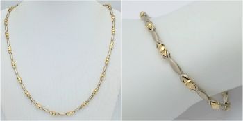 A STUNNING 14K WHITE GOLD NECKLACE AND BRACELET SET WITH 14K YELLOW GOLD SPHERE LINK SPACERS . 36.