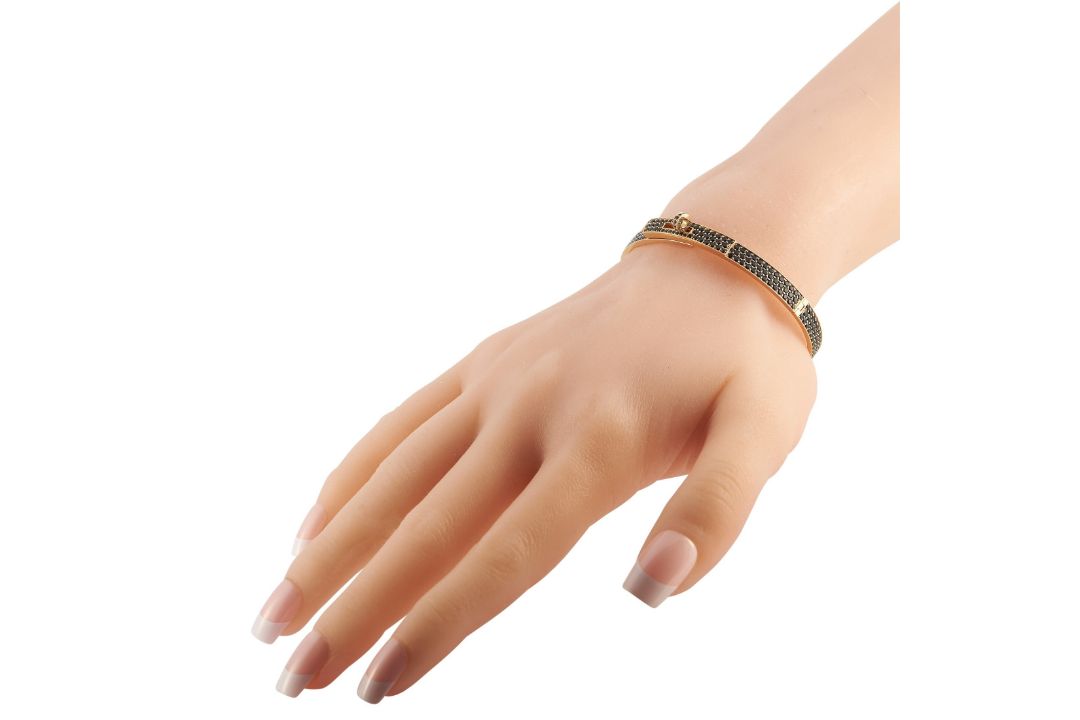 A Hermes Kelly 18K Rose Gold Spinel Bracelet. The bangle features inset spinel gemstones. Crafted - Bild 2 aus 4