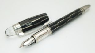 A Montblanc Starwalker Black Mystery Fountain Pen - Features a unique laser-engraved pattern on a