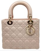 A Christian Dior Blush Pink Cannage Quilted Leather Lady Dior Handbag. Blush pink leather exterior