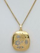 A 9K GOLD LOCKET PENDANT ON A 56cms 9K GOLD NECK CHAIN WITH NICELY DECORATED FRONT AND UNUSUAL