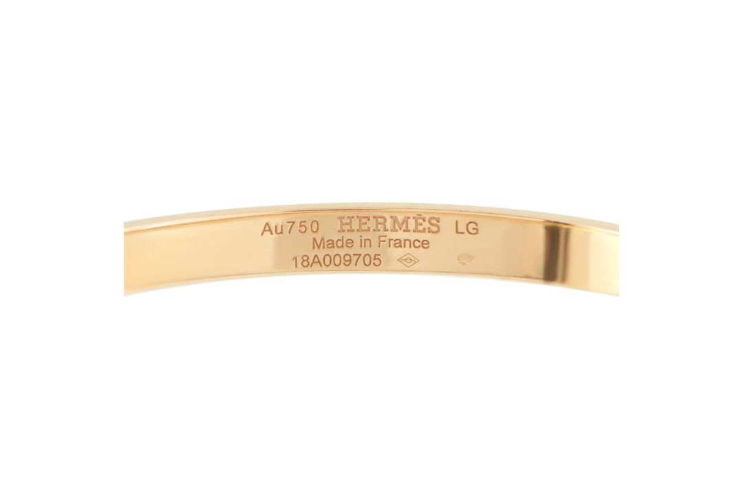 A Hermes Kelly 18K Rose Gold Spinel Bracelet. The bangle features inset spinel gemstones. Crafted - Bild 4 aus 4