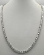 A W.G.I Certified 10K White Gold, Diamond Tennis Necklace. Set with 114 round brilliant lab grown