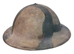 A British WW2 Era Malta Camouflage Helmet Dated 1940. Complete with original liner and chinstrap.