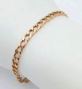 A 9K ROSEGOLD CURB LINK BRACELET . 4.2gms 19cms