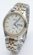 A SEIKO, 2 TONE, WHITE DIAL, SOLAR POWERED, DAY / DATE, BRACELET WATCH. IN WORKING ORDER. S/A 1684 -
