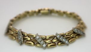 A VINTAGE PANTHER LINK BRACELET IN 9K GOLD FEATURING 5 DIAMOND STUDDED PANELS . 12.9gms 18cms