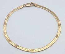 A CLASSIC 9K GOLD HERRINGBONE LINK BRACELET . 4.8gms 19cms
