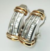 A PAIR OF 9K WHITE GOLD, WITH YELLOW GOLD ACCENTS, BAGUETTE CUT, DIAMOND SET EARRINGS. 0.60CTW. 13.