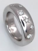 A Designer 'Pomellato' Diamond Iconica Band Ring. Different shaped deep set diamonds of 0.55ctw.