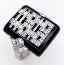 An 18K White Gold Art Deco Style Ring - A Rectangular Black Onyx Plaque Centred with an Intricate