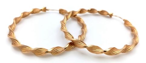 A Pair of 9K Yellow Gold Twist Hoop Earrings. 5.5cm diameter. 7.77g