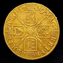 A 1709 Queen Anne Guinea Coin. Obverse - left facing draped bust of Queen Anne. Reverse - Crowned