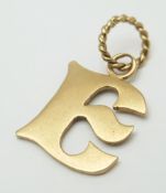 A 9K YELLOW GOLD, INITIAL E CHARM / PENDANT. 1.2G. SC 6004