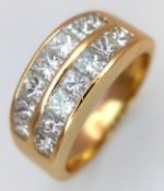 AN 18K YELLOW GOLD, 2 ROW, PRINCESS CUT DIAMOND SET BAND RING. 1.50CTW. 5.2G, SIZE J. SC 6074