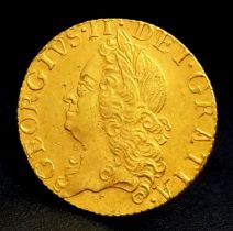 A 1759 George III Half Guinea Coin. Obverse - Old head. Reverse - Crowned shield of arms. 22k