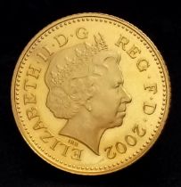 A 2002, QUEEN ELIZABETH II, 22K, UK 10 PENCE PIECE, PROOF CONDITION COIN. 12.65G. 22K GOLD. C 6007