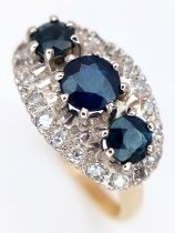 AN 18K YELLOW GOLD, DIAMOND AND SAPPHIRE RING. 5.8G, SIZE O. SC 6075