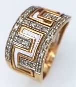 A GIA Certified Diamond Crossover Ring. A coveted D colour, 0.55ct round brilliant cut centre