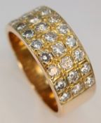 AN 18K YELLOW GOLD, 3 ROW, DIAMOND SET BAND RING. 1.15CTW. 10.2G, SIZE R. SC 7074