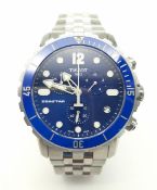 A Tissot Seastar Quartz Gents Watch. Stainless steel bracelet and case - 44mm. Blue rotating