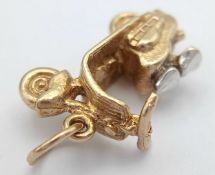 A 9K YELLOW GOLD, SCOOTER / MOPED CHARM / PENDANT. 3.2G. SC 7012