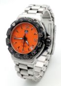 A Tag Heuer Formula 1 Quartz Ladies Watch. Stainless steel bracelet and case - 34mm. Orange dial