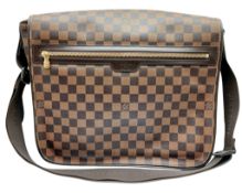 A Louis Vuitton Damier Ebene Spencer Messenger Bag. Brown Damier Ebene coated canvas exterior with