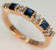 A 9K Yellow Gold, Sapphire and Diamond Seven Stone Ring. Alternating gemstones. Size L 1/2. 2.8g.