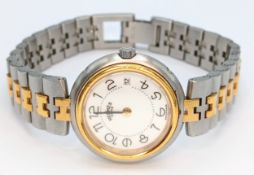 An Hermes Profile Two Tone Quartz Ladies Watch. Gilded H stainless steel bracelet. Two tone