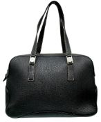 A Salvatore Ferragamo Black Leather Handbag. Black grained leather exterior with silver-tone