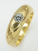 An 18K Yellow Gold (tests as) Diamond Set Band Ring. 0.15ct deep-set round cut diamond. 5.5g total