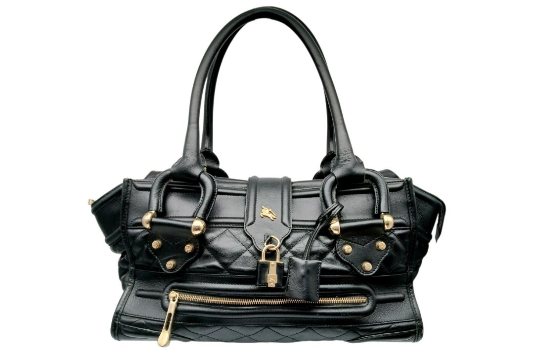 A Burberry Black Quilted Leather Manor Bag. Black leather exterior with diamond-quilted panels, - Bild 1 aus 13