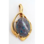 A Beautiful 18k Yellow Gold Opal Triplet Pendant. The Pendant measurers 2 x 1.1cm and has a gross