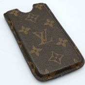 A Brown Louis Vuitton Monogram Canvas Phone Case. Brown Monogram coated canvas exterior with an