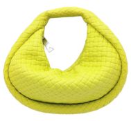 A Bottega Veneta Padded Jodie Bag. Kiwi green woven rubber exterior in the signature Intrecciato