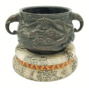 An Antique Chinese Bronze Incense Burner Featuring a High-Relief Embossed Dragon-and-Cloud Motifs.