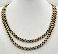 A 9K Yellow Gold Fancy Circle Link Chain Necklace. Matinee length at 84cm. 20.7g.