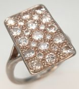 A 18k white gold diamond cluster ring, 1.45ct diamond weight, 8.5g total weight, ring size O