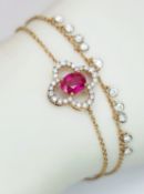 AN 18K ROSE GOLD, DIAMOND AND RED STONE SET BRACELET. RED STONE TESTS AS CORUNDUM. 3.6G. SC 8087